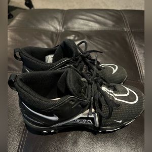 Nike Youth Football cleats. Used for one flag football season. Size 2.5. Black.
